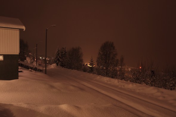 Silence down the street. The City Council having gamled away all our money - is forced to shut off the streetlights at night to save money. 