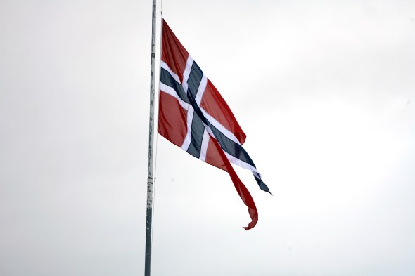 The Norwegian flag flying on half mast at Evenes Airstation, in connection with the memorial service for the norwegian Hercules crew that crashed in Kebnekaise