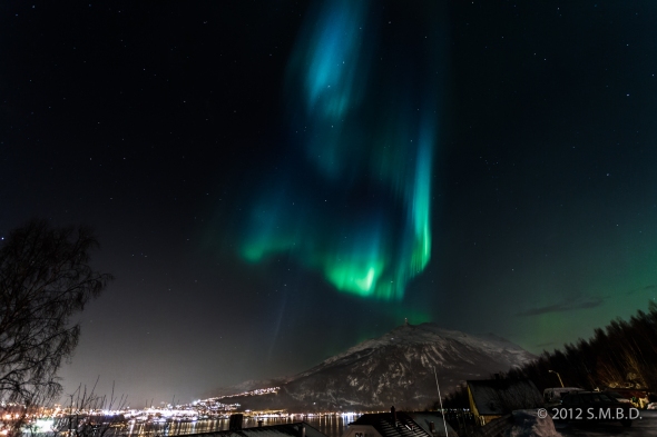 Northern Lights January 23. 2012 with the Fagernes mt. and parts of the city Narvik in the foreground.